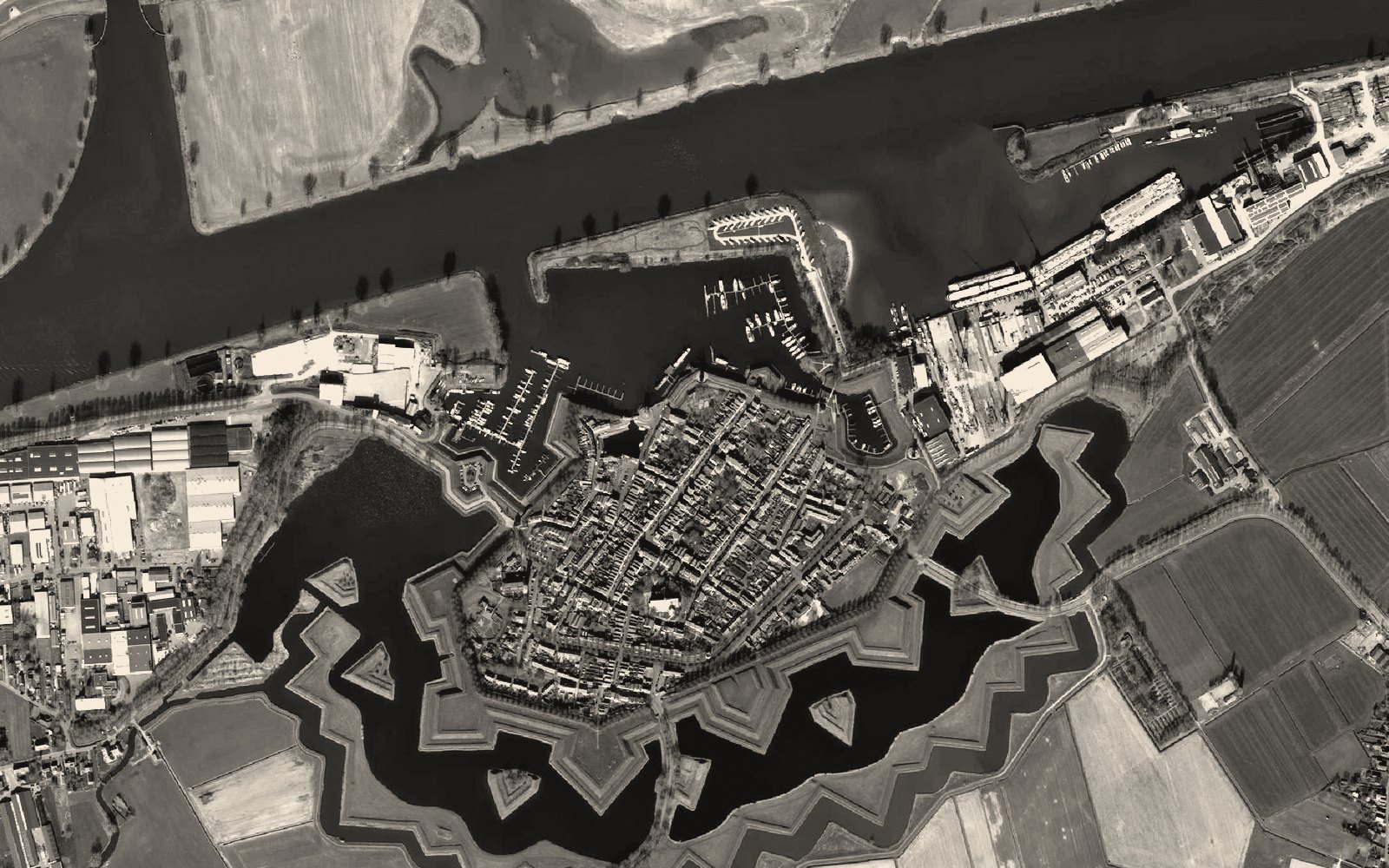 Aerial view of a star-fortified town: yesterday's permanent advantage, outpaced by change